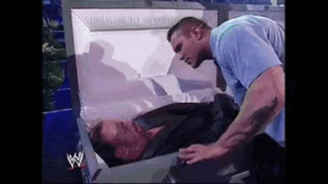 Undertaker Choke GIF - Undertaker Choke Necrophilia GIFs