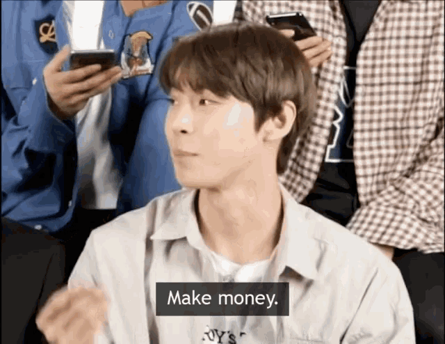 a man in a gray shirt says make money
