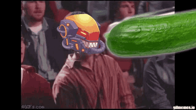 a man with a robot helmet on his head is being attacked by a pickle