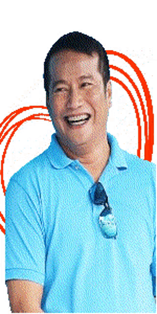 a man in a blue shirt is smiling in front of a heart