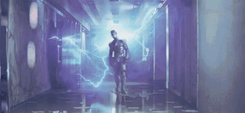 a person is standing in a hallway with lightning coming from the ceiling .