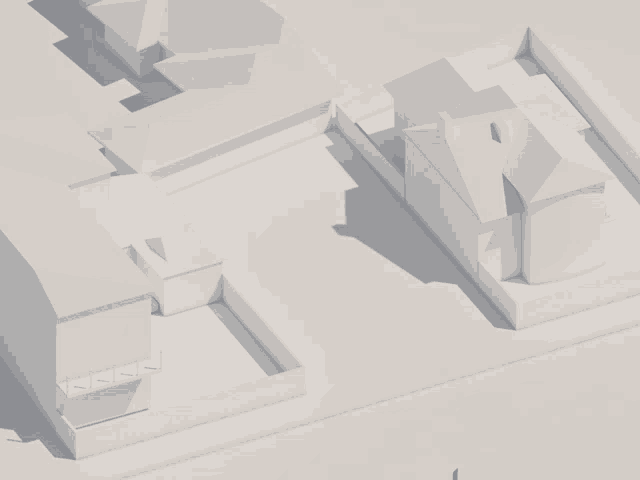 an aerial view of a residential area with houses and fences