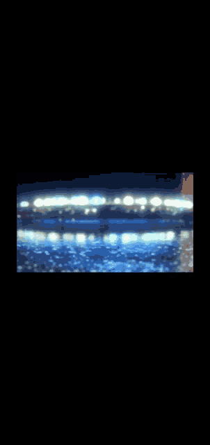 a blurred image of a city at night