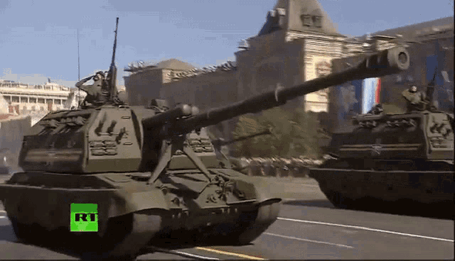a green tank with the word rt on the side of it