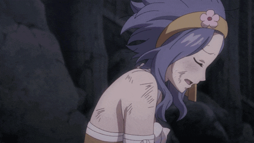 a girl with a flower in her hair has a scar on her shoulder