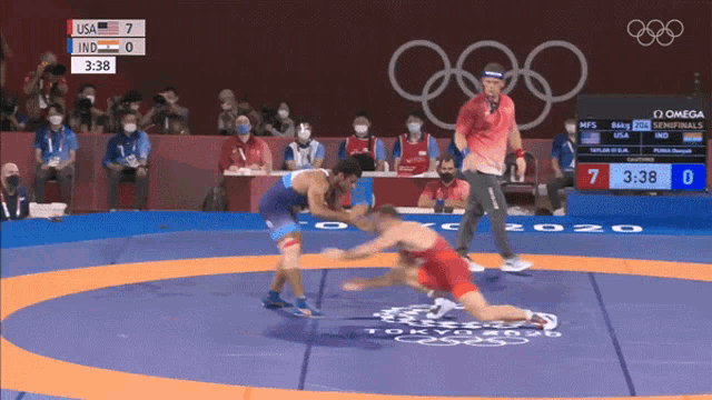 a wrestling match between india and usa is being broadcast on omega