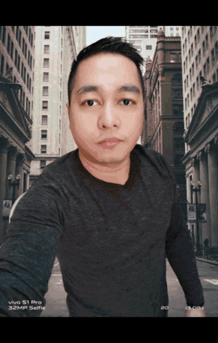 a man taking a selfie with a vivo s1 pro camera