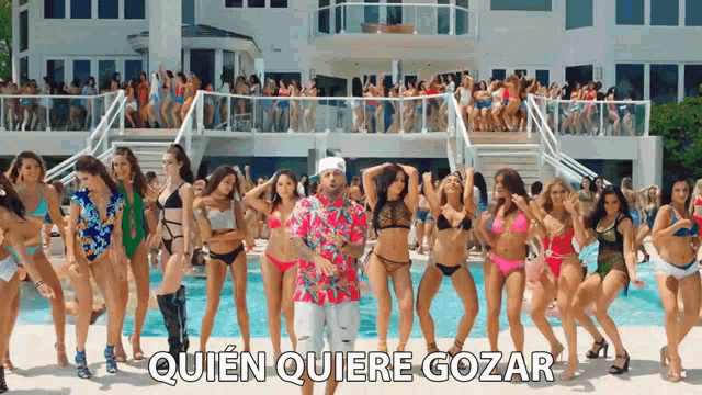 a group of women in bikinis are dancing in front of a pool with the words quien quiere gozar written above them