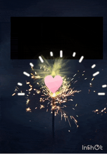 a pink heart is surrounded by sparklers and the word event is on the bottom