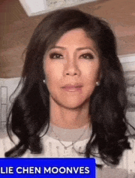 a close up of a woman 's face with the words lie chen moonves written on the bottom .