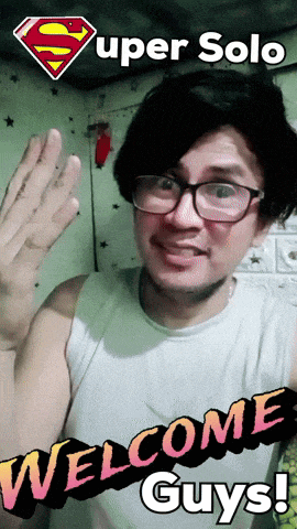 a man wearing glasses says welcome guys