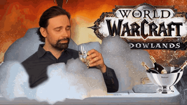 a man in a bathtub with bubbles and a world of warcraft logo