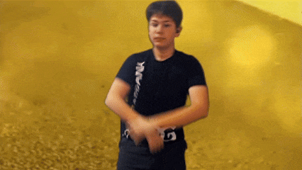 a young man wearing a black shirt that says ninja