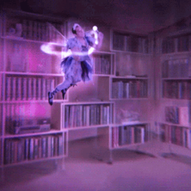 a fairy is flying through the air in a library