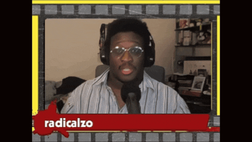 a man wearing headphones and glasses is talking into a microphone and the word radicalzo is on the bottom right