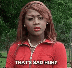 a woman wearing a red jacket and a pearl necklace is saying `` that 's sad huh '' .