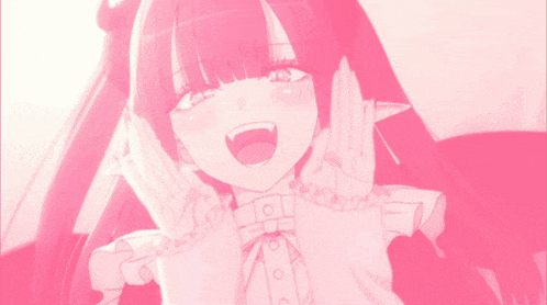 a girl in a pink dress is smiling and giving a peace sign