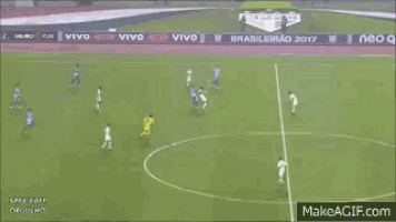 a soccer game is being played on a field