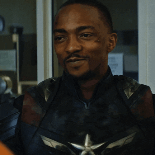 a close up of a man in a captain america uniform