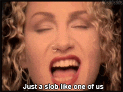 a close up of a woman 's face with the words just a slob like one of us on the bottom