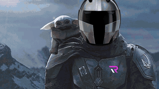 a motorcycle helmet with the letter r on the front