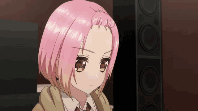 a girl with pink hair and yellow eyes is looking at something