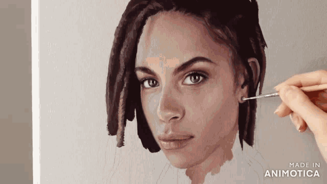 a painting of a woman 's face is being made in animatica
