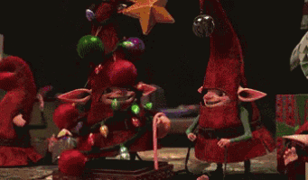a group of gnomes are decorating a christmas tree with candy canes and lights
