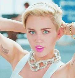 Miley Cyrus Valentines Day GIF - Miley Cyrus Valentines Day Wink GIFs