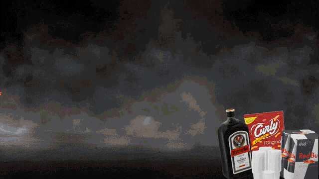 a bottle of jagermeister next to a package of curly chips