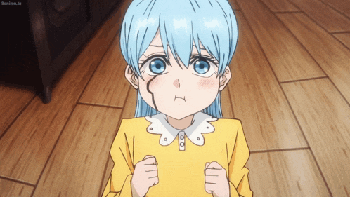 a little girl with blue hair and a yellow shirt is looking at the camera
