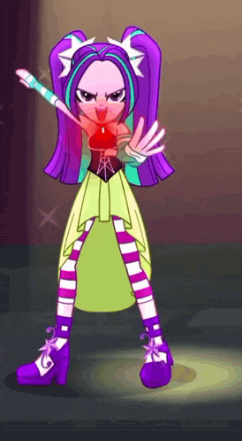 a cartoon girl with purple hair and striped pants is standing on a stage
