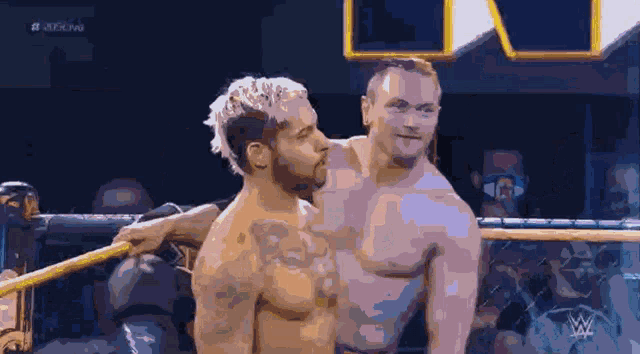 two men in a wrestling ring with the hashtag # 2015live on the bottom right