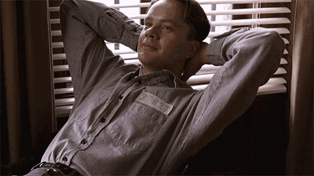 Relaxing Andy Dufresne GIF - Relaxing Andy Dufresne The Shawshank Redemption GIFs