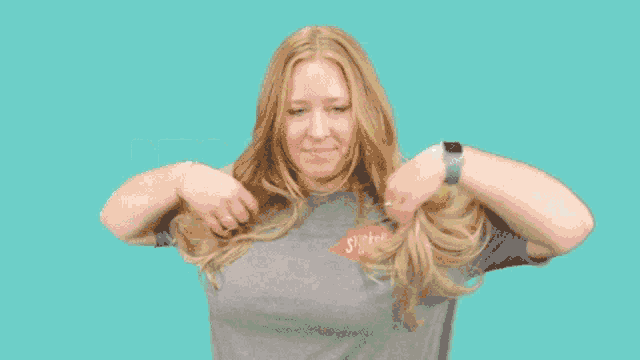 a woman is wearing a shirt that says sticker giant on it