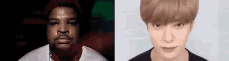 a man and a boy are looking at the camera .