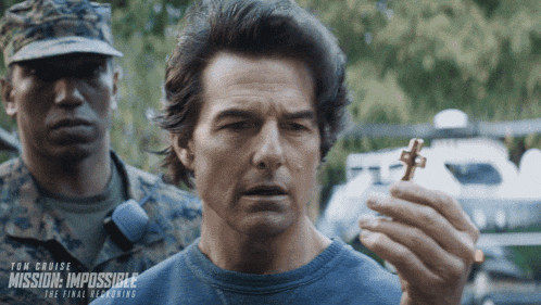 a movie poster for mission impossible the final reckoning shows a man holding a key