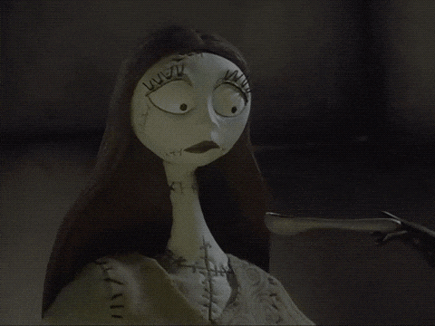 sally from the nightmare before christmas has stitches on her face and neck