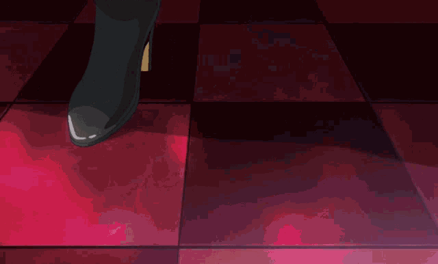 a man standing in a room with a couch and a candle on the floor