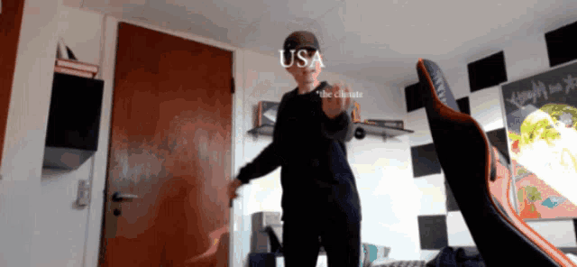 a person in a room with the word usa on the bottom