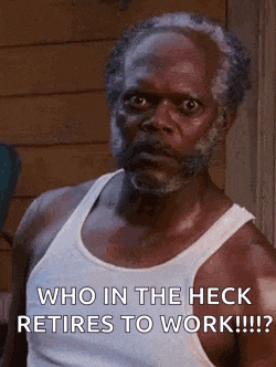 a man with a beard is wearing a white tank top and says `` who in the heck retires to work !!! ''