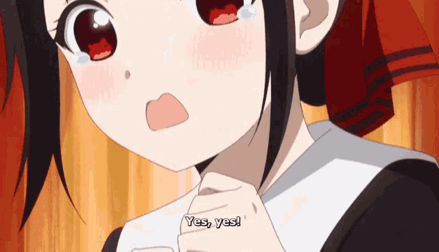 a girl with tears in her eyes is saying " yes yes "