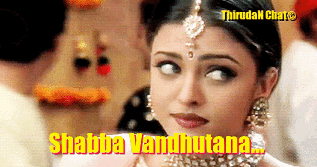 a close up of a woman 's face with the words shabba vandhutana on the bottom