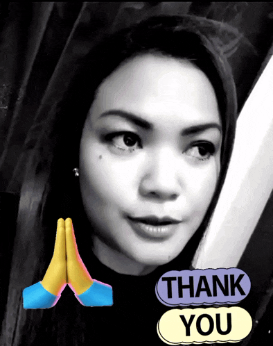 a black and white photo of a woman with a thank you sticker next to her