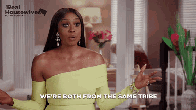 a woman says we 're both from the same tribe in front of a real housewives logo