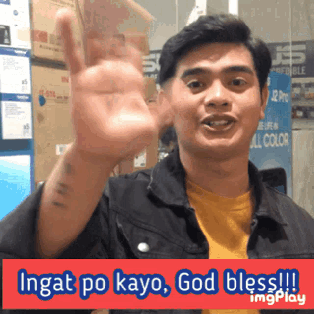 a man in a black jacket and yellow shirt says " ingat po kayo god bless!!! "