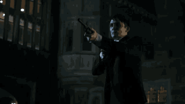 a man pointing a gun at another man with the words he killed my mother jim below him