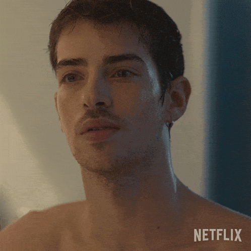 a shirtless man with a netflix logo on the bottom