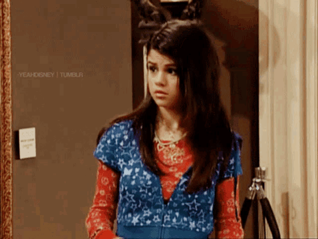 a girl standing in front of a door with yeahdisney tumblr written on the bottom right