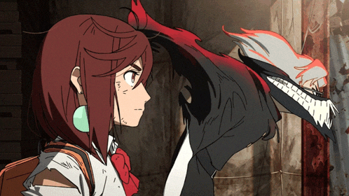 a girl with a backpack stands next to a monster with its mouth open